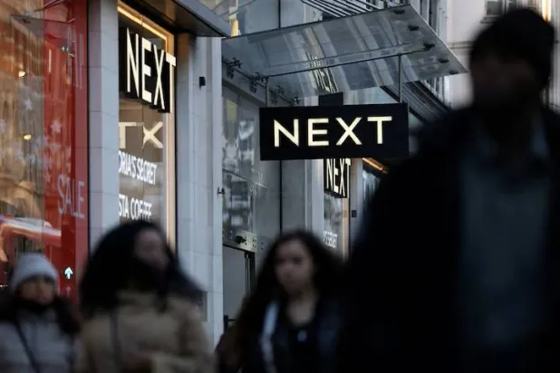 Next Nudges Up Profit Guidance but Sees UK Headwinds