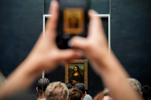 Germans Arrested for Louvre Stunt in Mona Lisa Hall