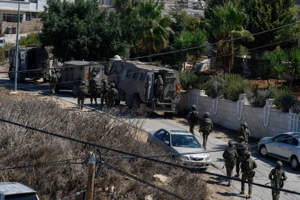 Israeli Forces Raid Town of Suspected Palestinian Gunman