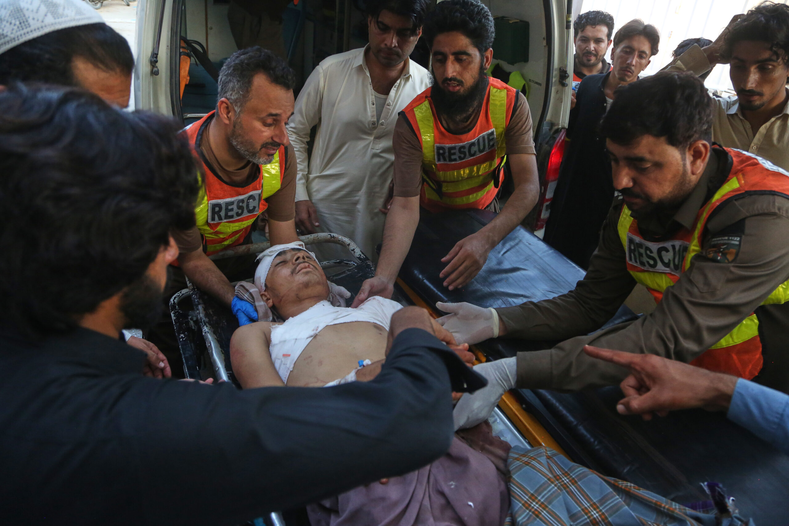 Bombing at mosque near police offices in Pakistan kills at least 21