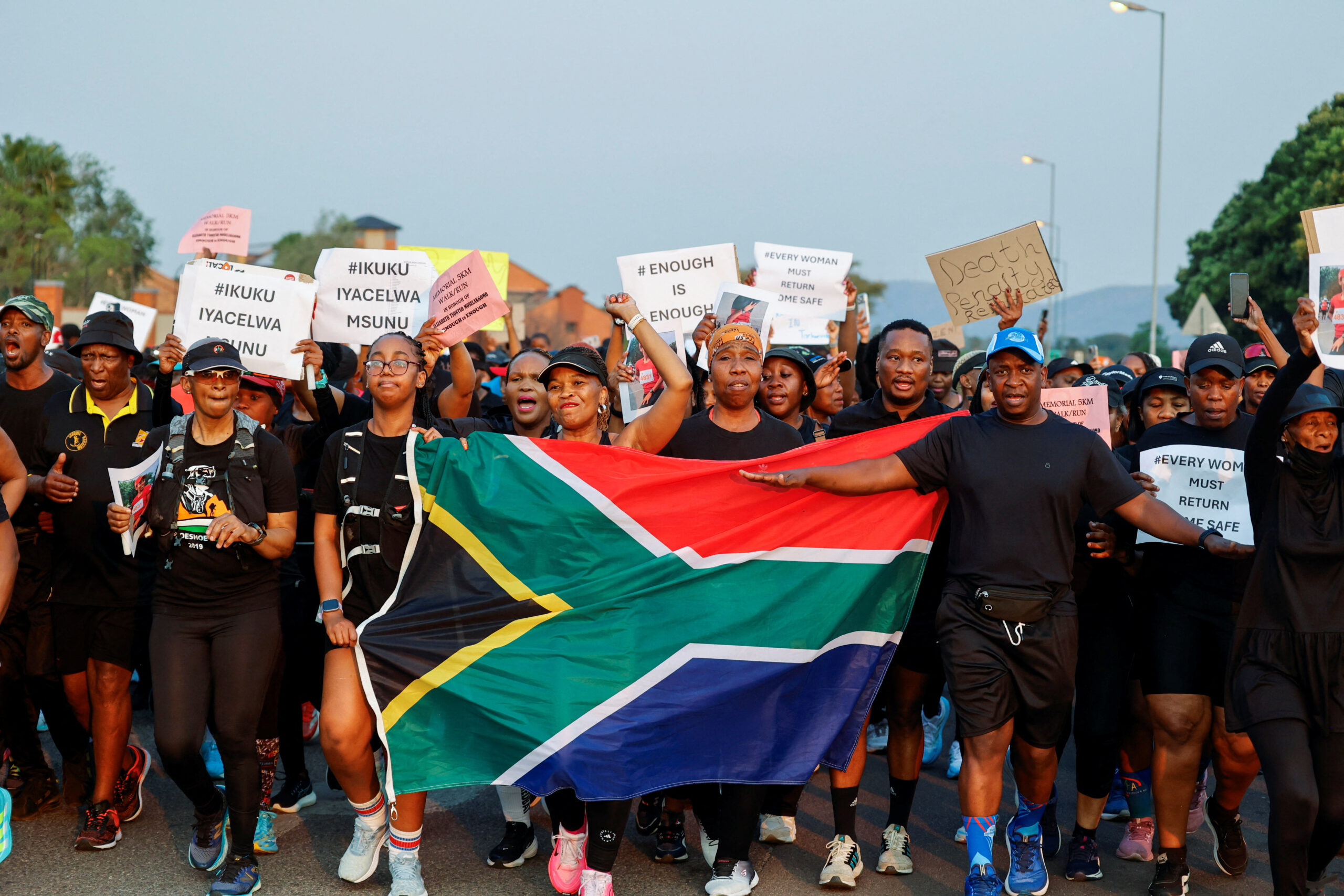 After deaths of nine women, South Africans gather to run, mourn and demand change