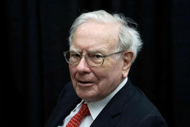 Warren Buffett steps down as Berkshire chairman, son Howard succeeds