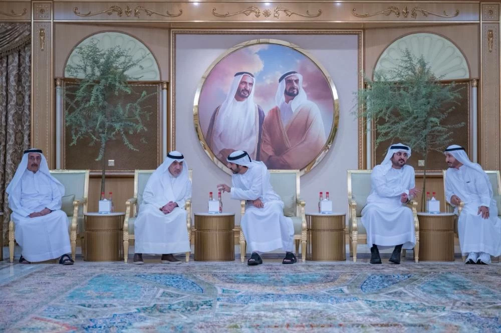 Hamdan bin Mohammed, alongside Maktoum bin Mohammed and Ahmed bin Mohammed, receive condolences for a third day