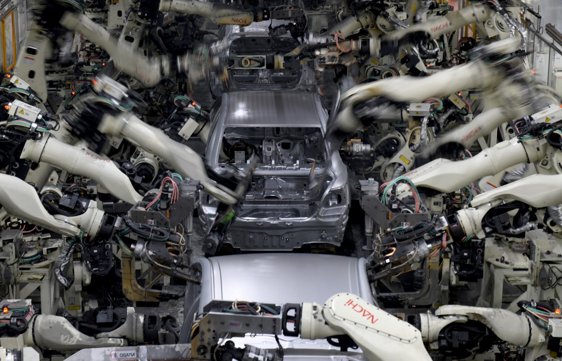 Toyota orders workers to train robots, says humans won’t be replaced