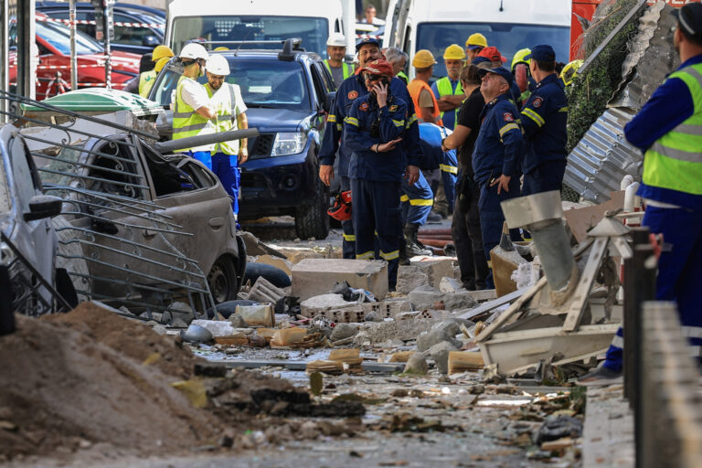 Rescuers pull 2 unconscious from collapsed building near the Acropolis in Greece