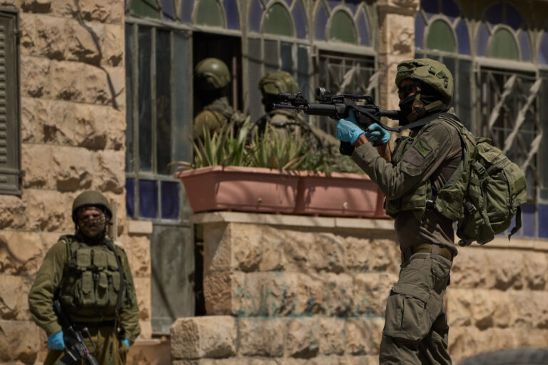 Israeli forces raid town of suspected Palestinian gunman: local authorities