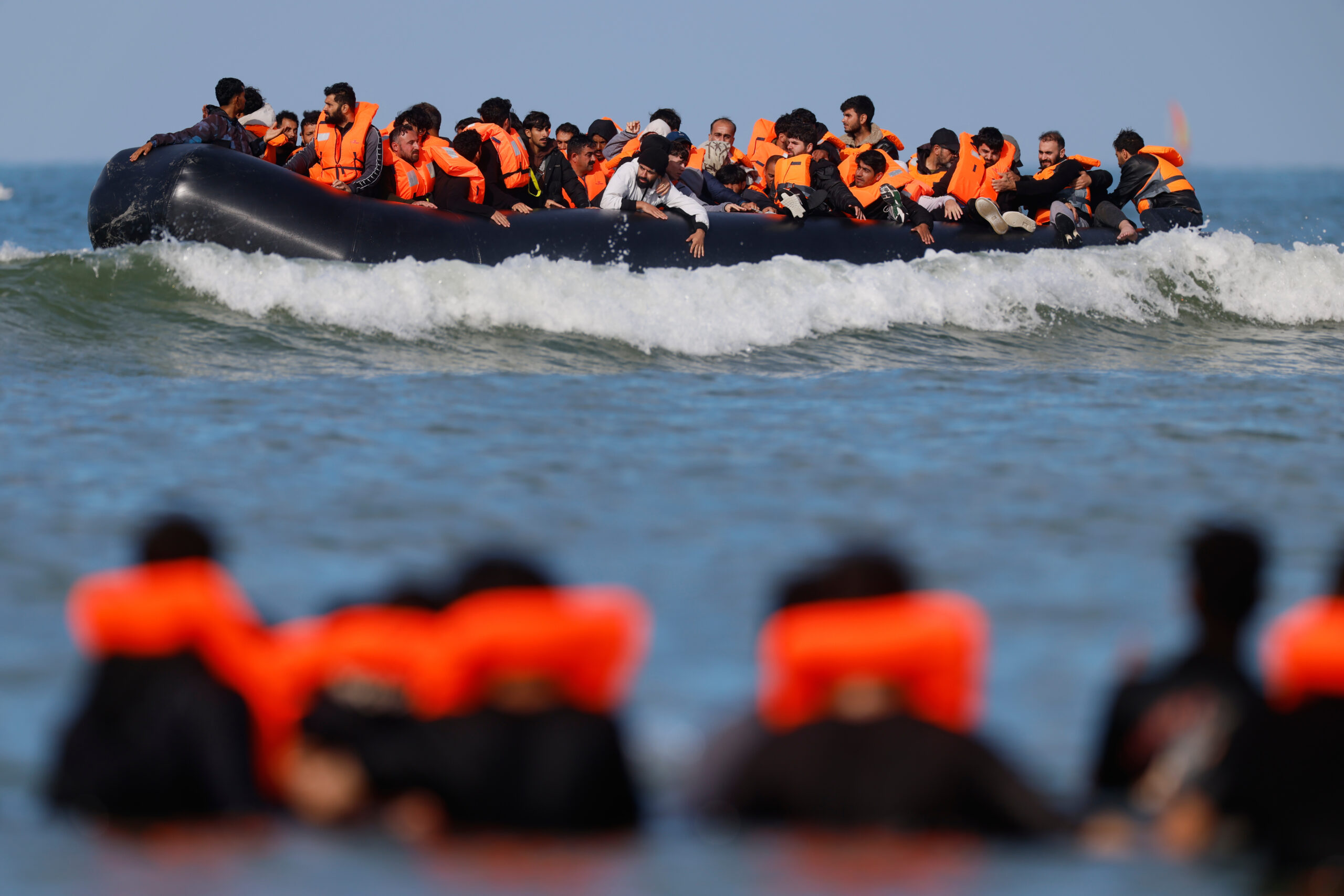 Judge keeps UK far-right activist in jail for trial on slashing migrant dinghy