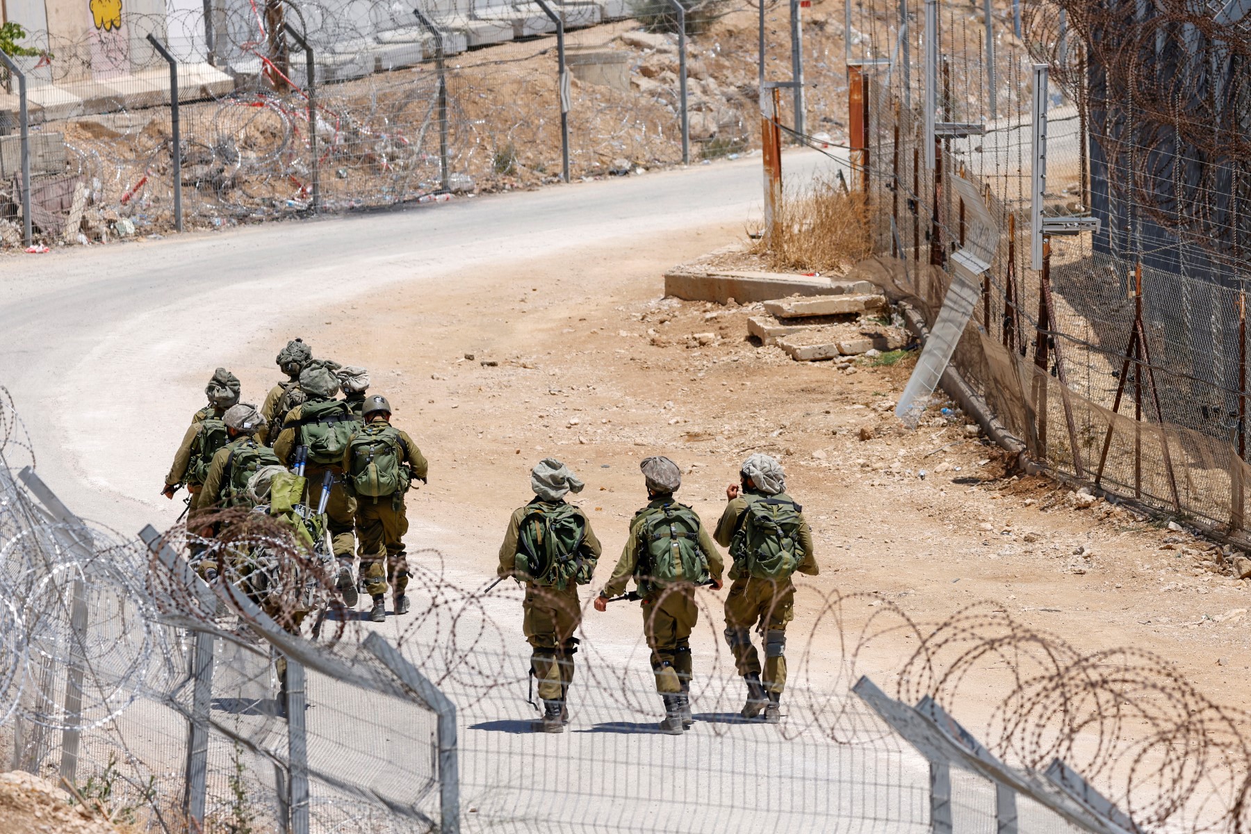 Israeli troops burned house, feed warehouse in southern Syria, state media say