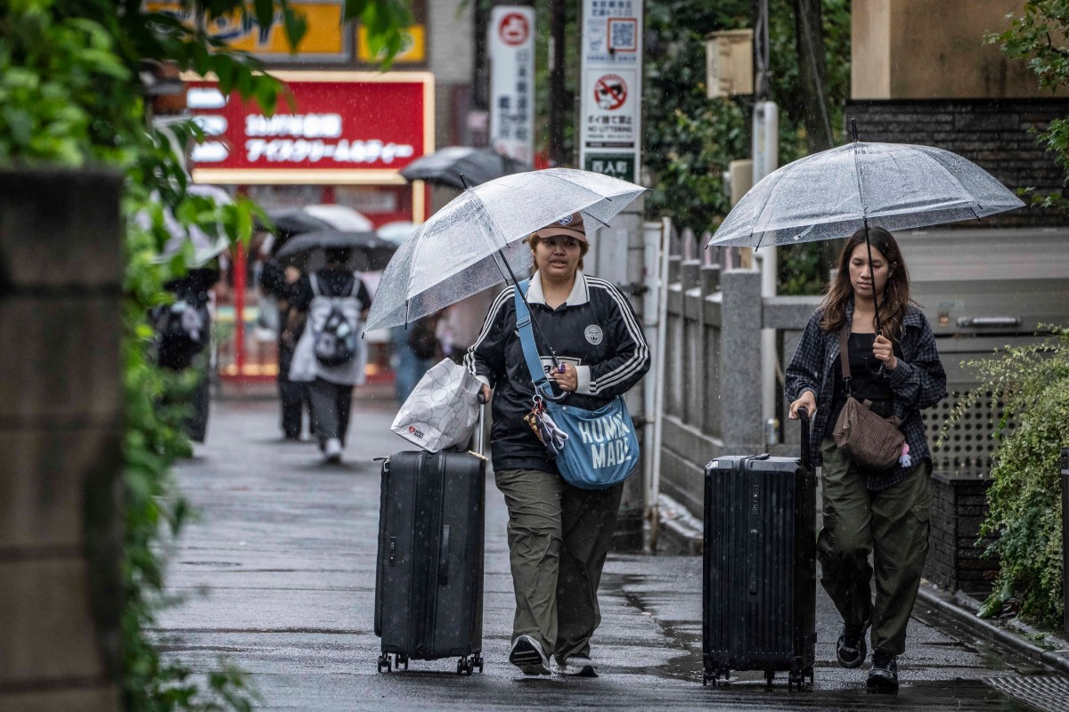 Japan says hosting record number of foreigners
