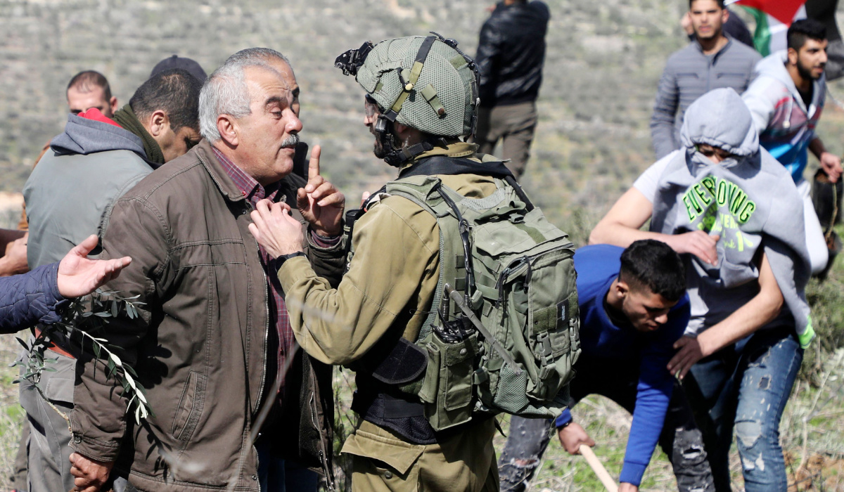 Israeli forces fire tear gas at olive farmers near Ramallah