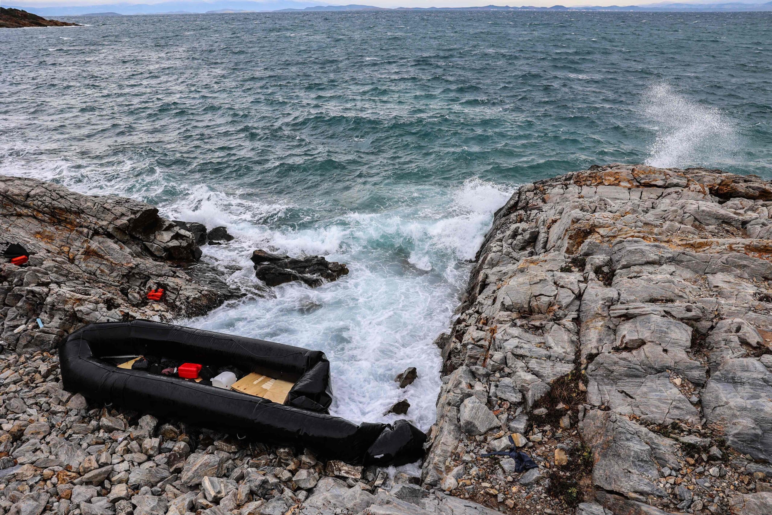Twelve migrants, including infant, drown as boats capsize off Greek islands