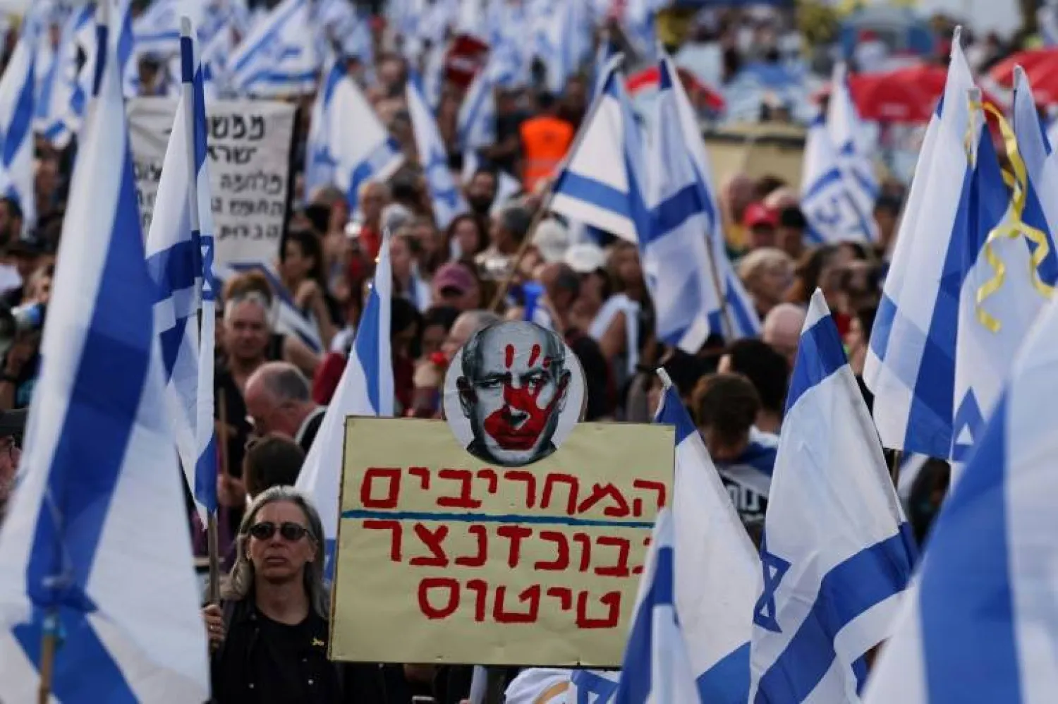 Thousands rally in Tel Aviv against Netanyahu ahead of vote