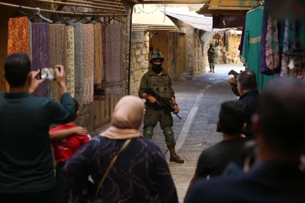 War in the Heart of Hebron: 500 Settlers Share Daily Life with Thousands of Palestinians