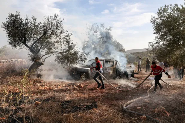 Israeli Settlers Attack Palestinians During Olive Harvest