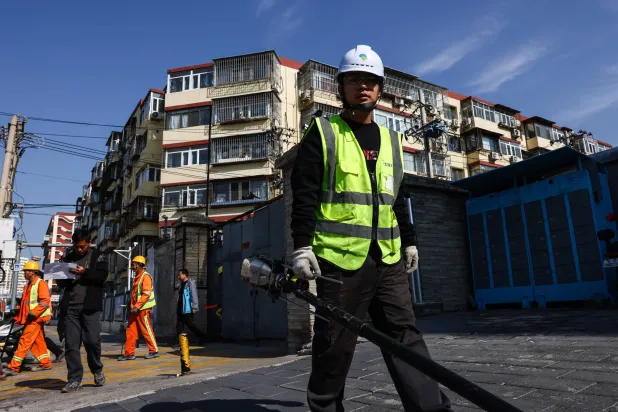 China’s Economic Growth Picks up as Exports Boom, Consumers Balk
