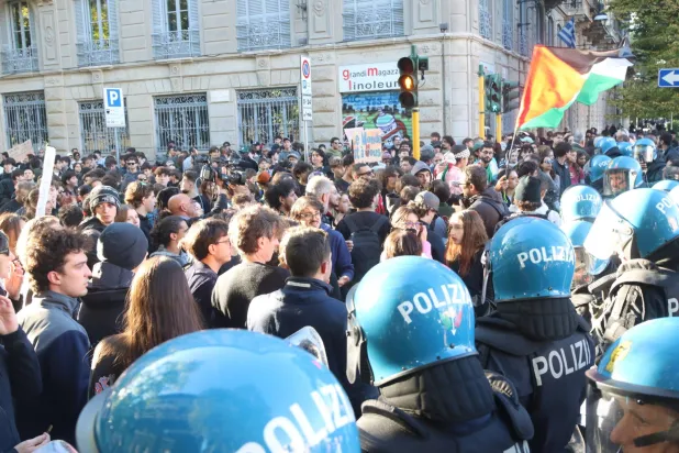 Soldiers Guard Center of Milan as Thousands of Protesters March in Cities Across Europe