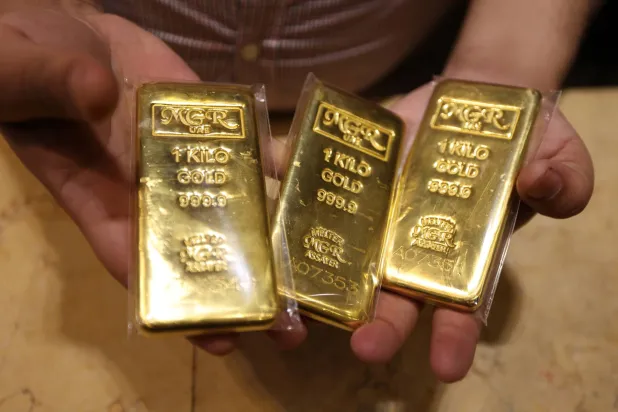 Gold Slips as Markets Assess Fed Signals, Await US Inflation Data