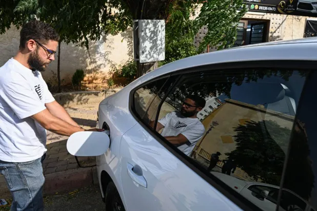 Dodging Fuel Price Hikes, Damascus Drivers Turn to Electric Cars