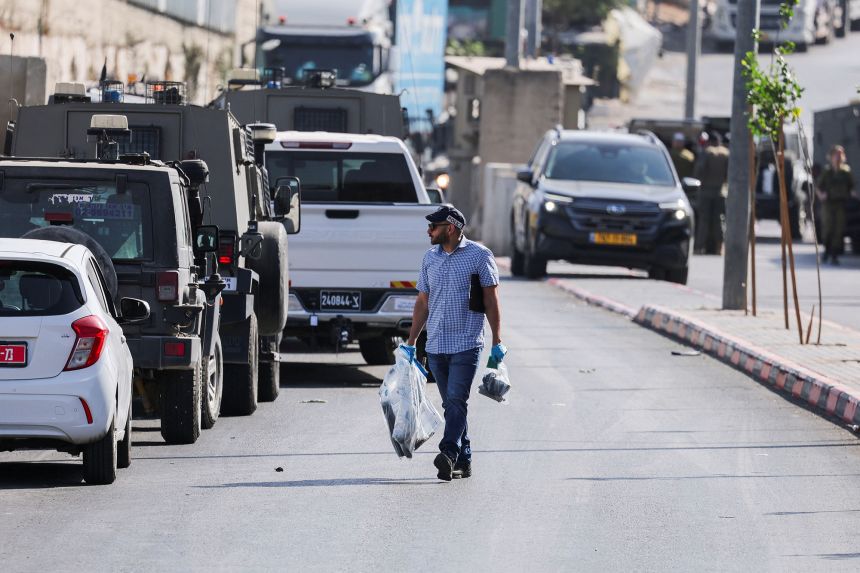 Israel begins demolitions in West Bank city after two soldiers killed in shooting attack