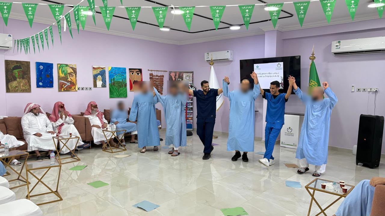 «احتواء» تحتفي باليوم الوطني بإطلاق برامج توعوية ومجتمعية
