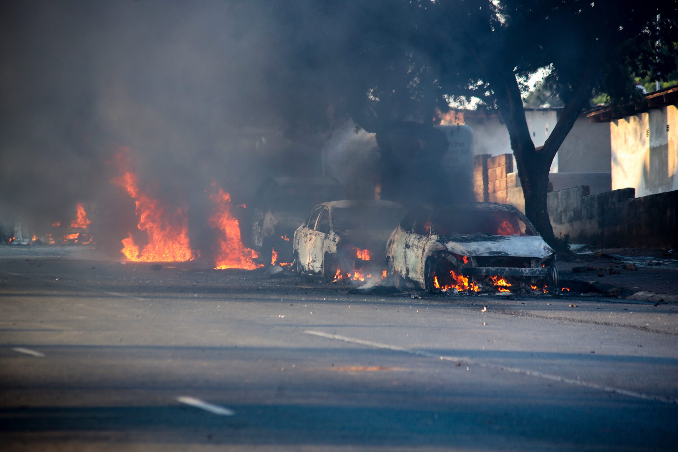 Vehicles torched in South Africa as protests over asylum ruling rage on