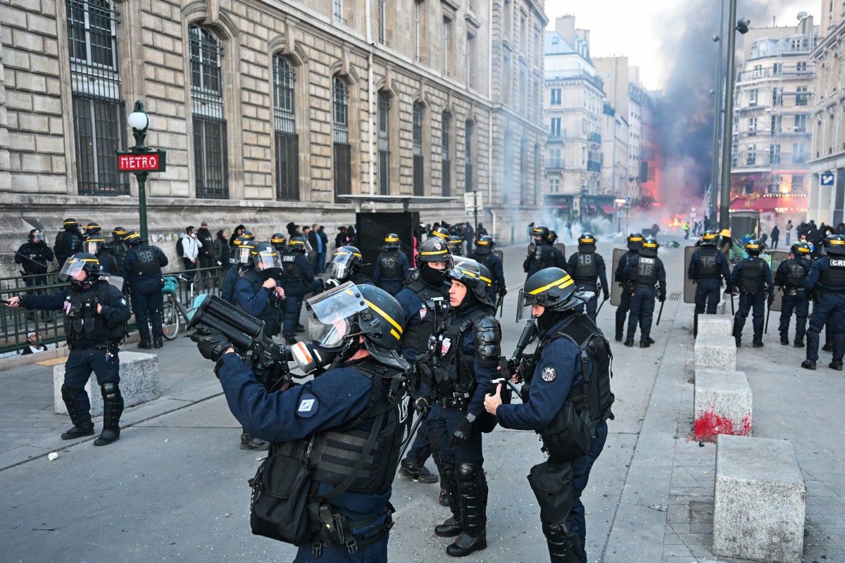 Macron rejects interior minister’s bid to resign over violent protests