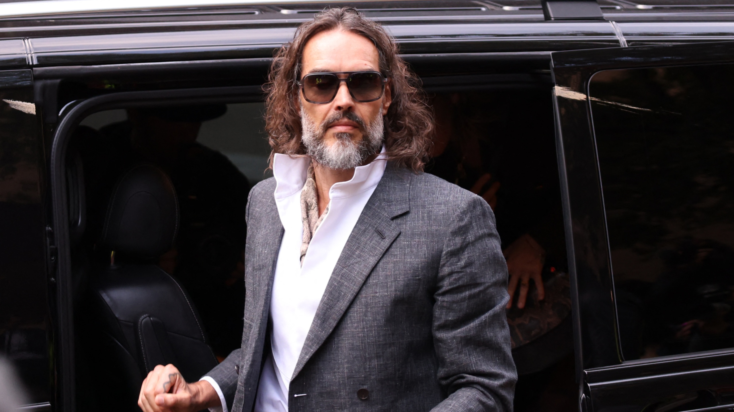 Russell Brand Trial: Woman details alleged rape after being asked to take half-naked photos