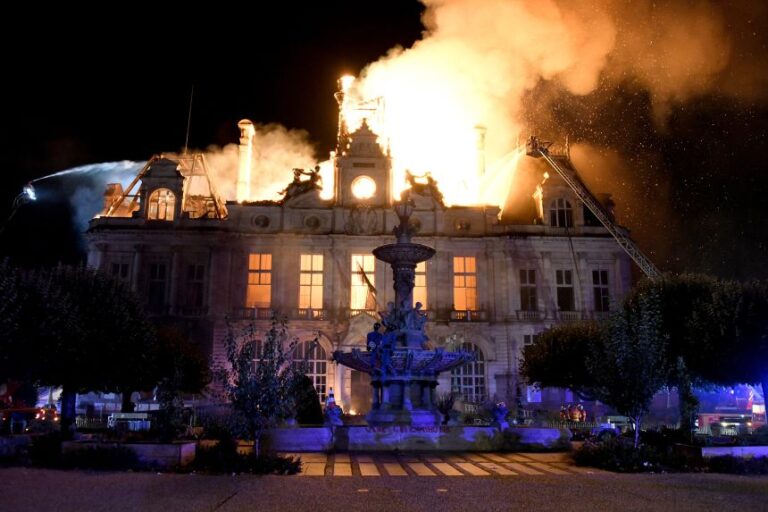 Buildings torched and over 1,000 detained after half a million protesters sweep France
